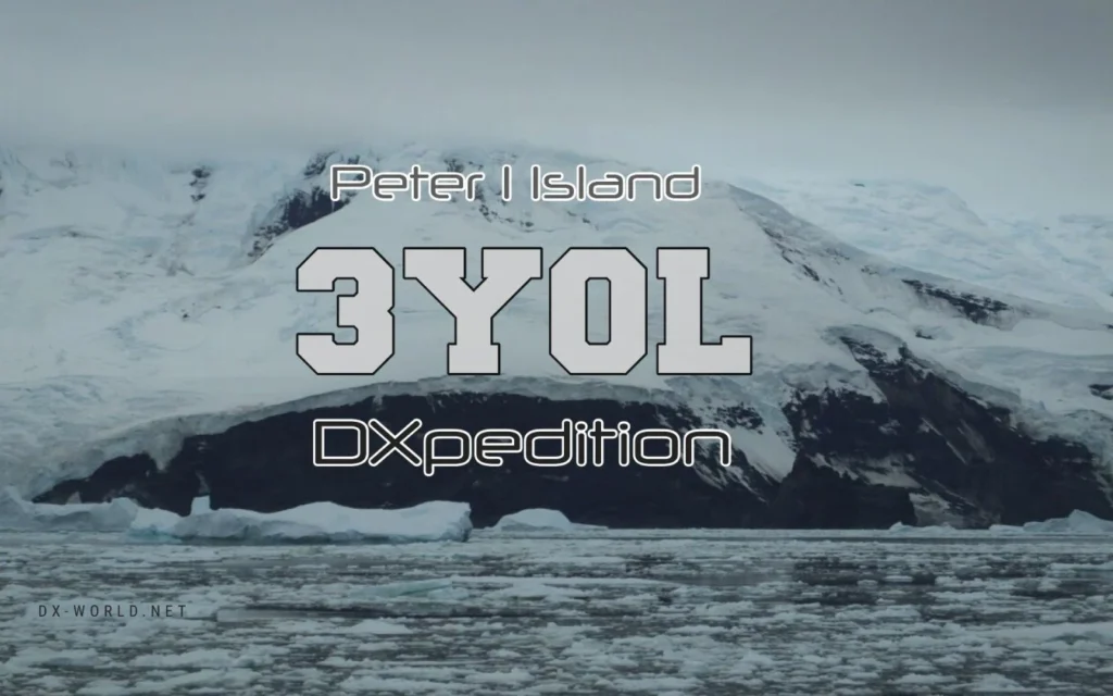 Vista de Peter I Island com gelo e montanhas ao fundo, destacando a expedição 3Y0L