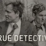 True Detective: cena dramática com dois homens em campo aberto