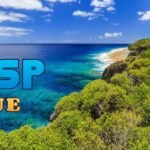 Vista panorâmica de Niue com mar azul e vegetação verde